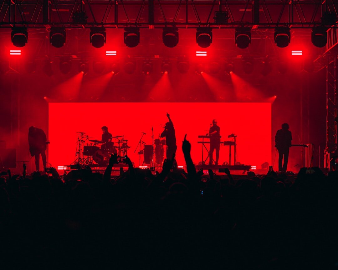 Live concert stage filmed by multiple broadcast cameras