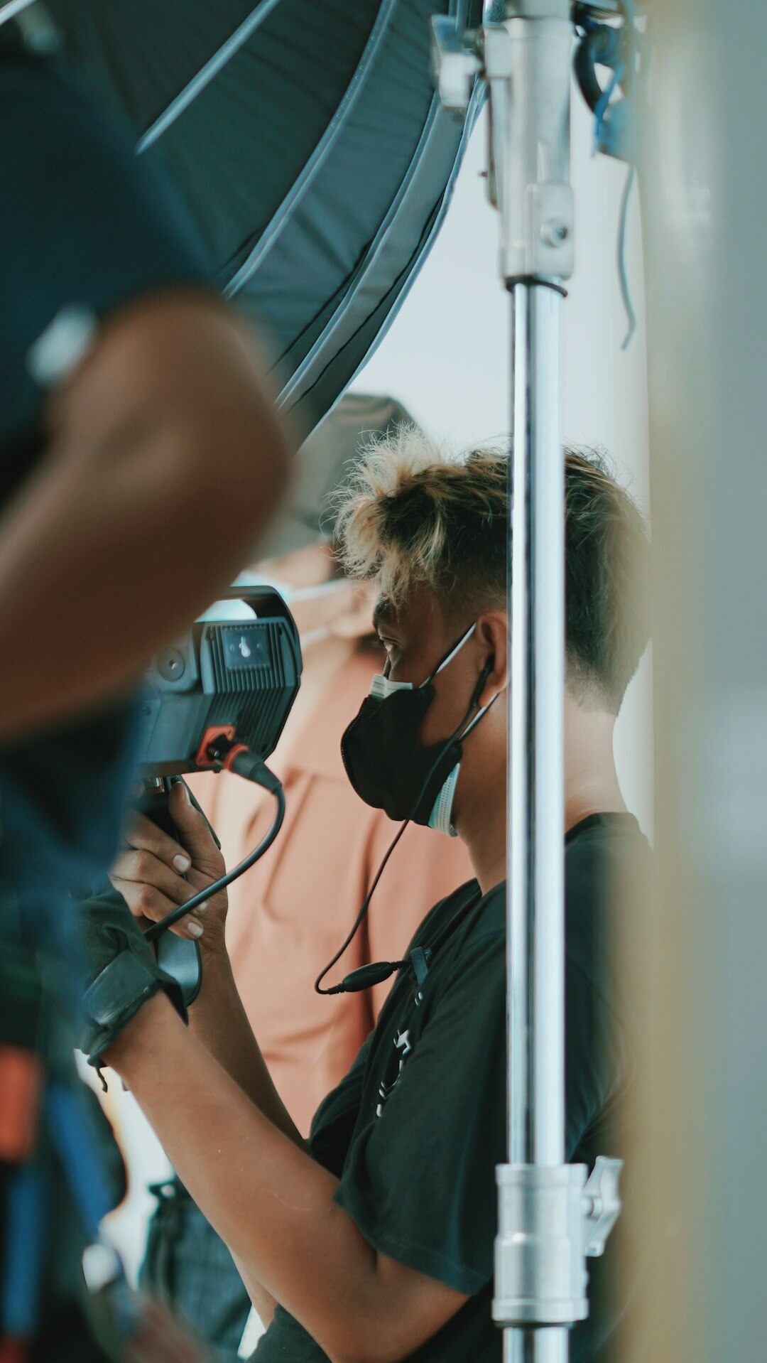 Production crew reviewing footage on a monitor together